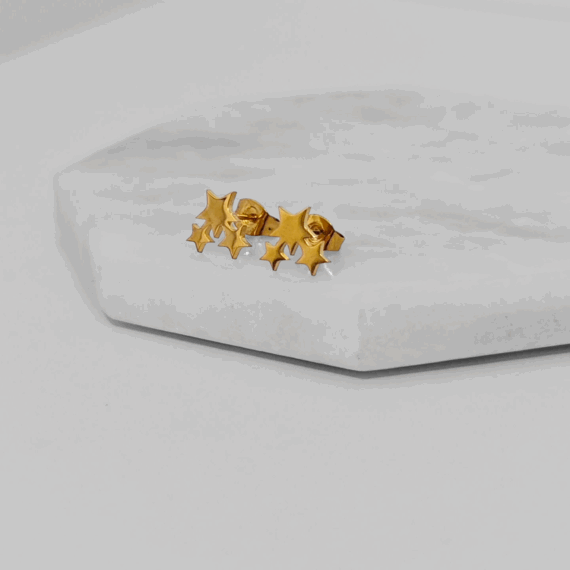 ARETES STUD TRES ESTRELLAS DORADO