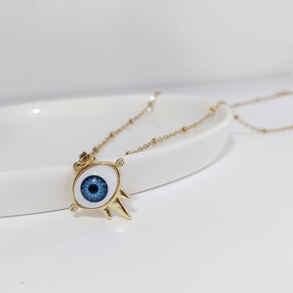 COLLAR OJO DORADO