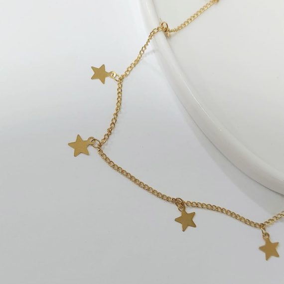 COLLAR DORADO CON 7  DIJES DE ESTRELLAS
