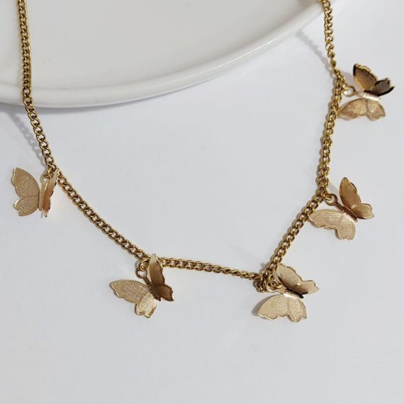 COLLAR CON DIJES DE MARIPOSA